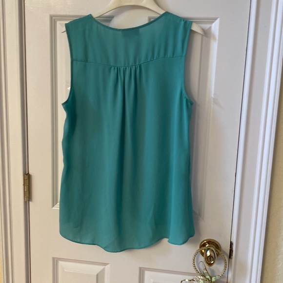 **2 for 20**Thalia Sodi Light Green Sleeveless
Blouse with Silver Metal Accent - Picture 6 of 13